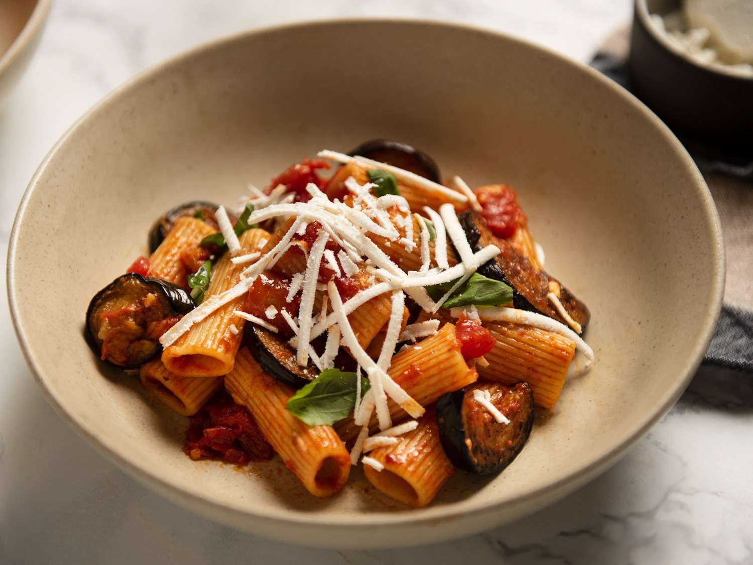 Pasta alla Norma (Sicily): Tomato sauce with fried eggplant and ricotta salata
